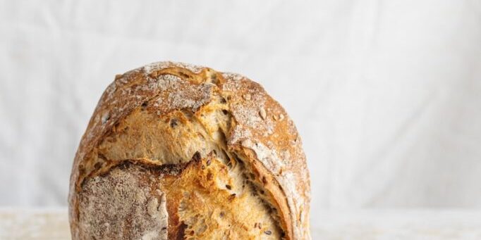 brown bread on white textile